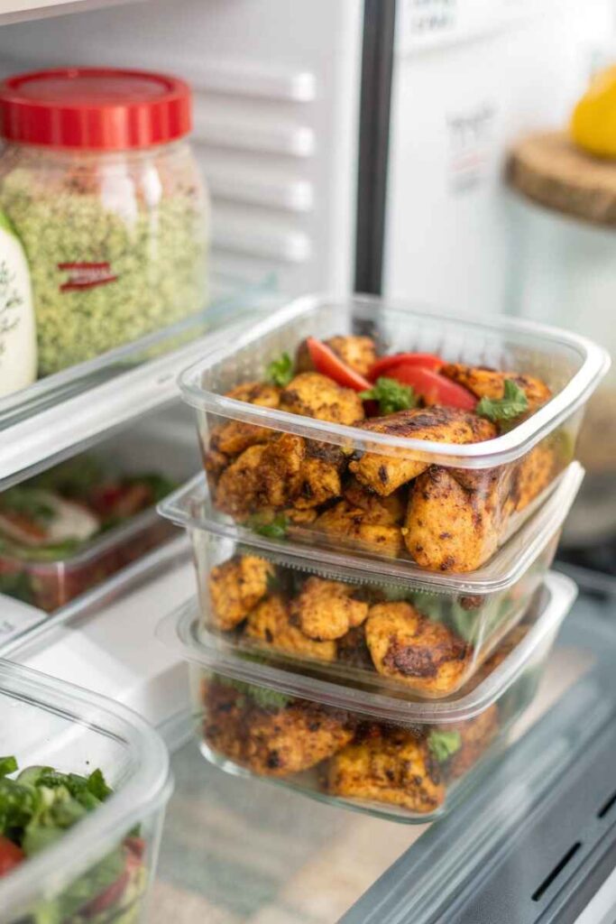 Chipotle chicken in glass storage containers