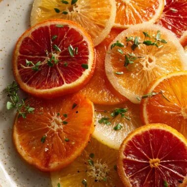 Slices of candied orange served on a plate