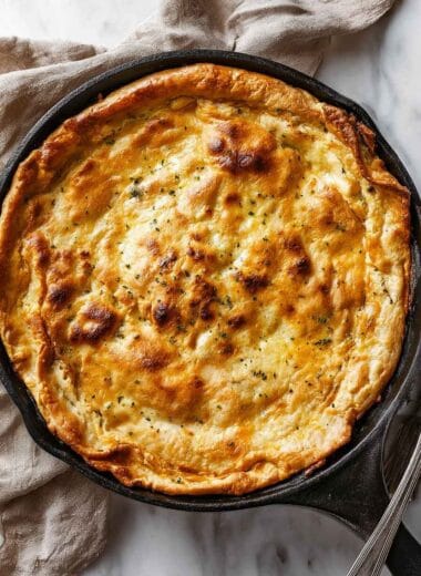 Low carb chicken pot pie in a skillet with a golden crust