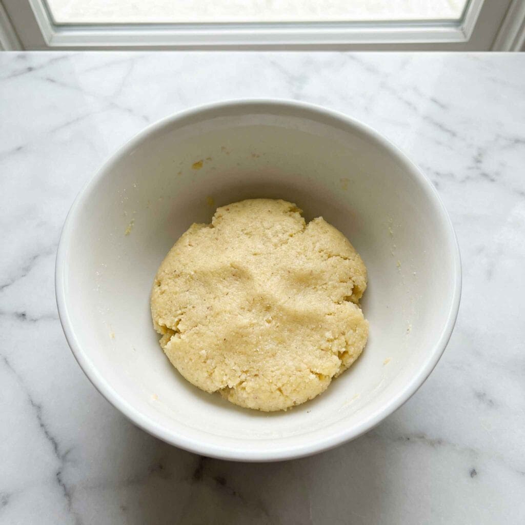 Low carb crust dough for chicken pot pie in a white bowl