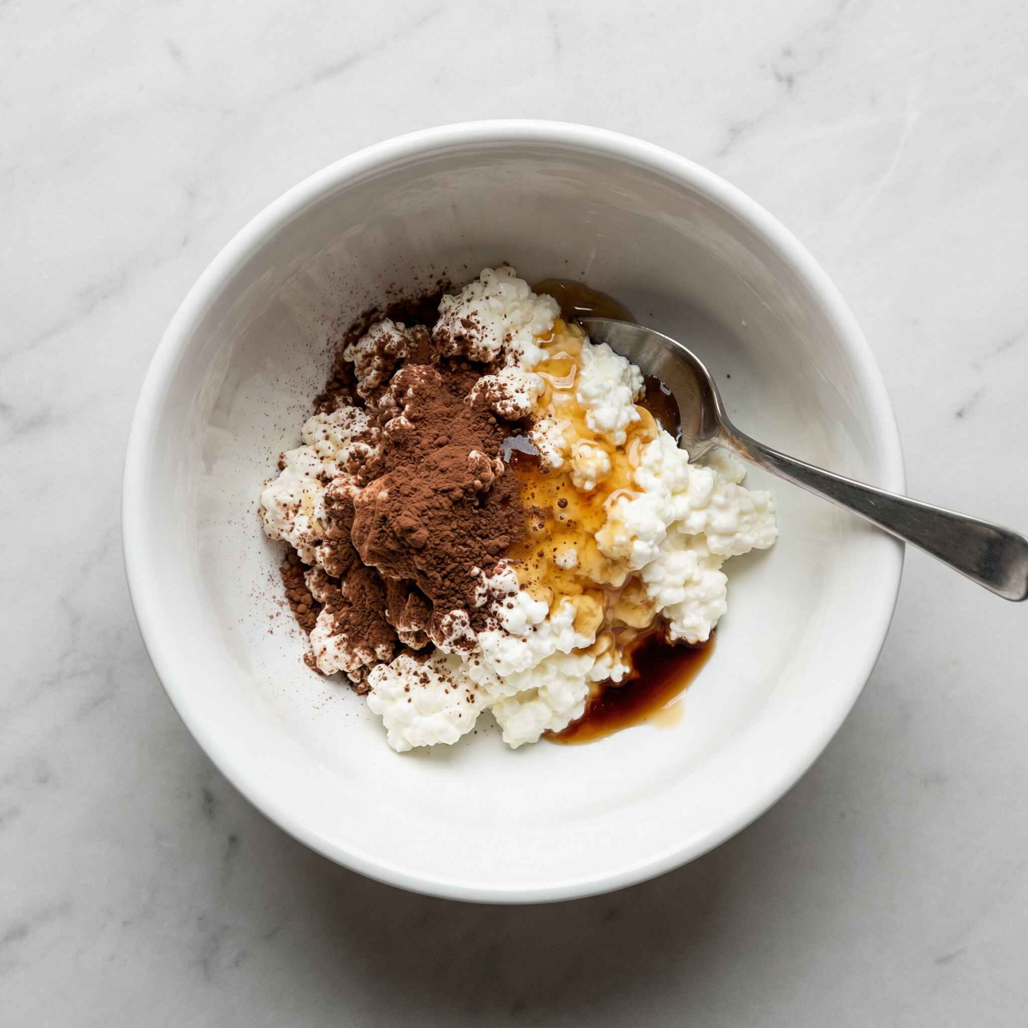 cottage cheese chocolate bites ingredients in bowl before mixing