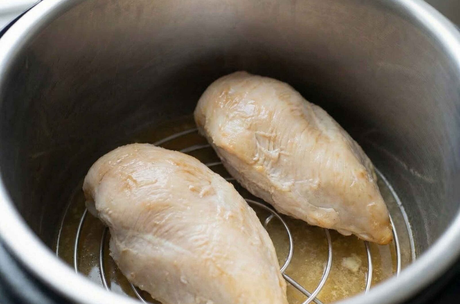 Cooked chicken in Instant Pot cooked chicken breast instant pot result