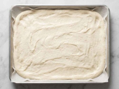 cottage cheese flatbread dough spread thin in baking tray
